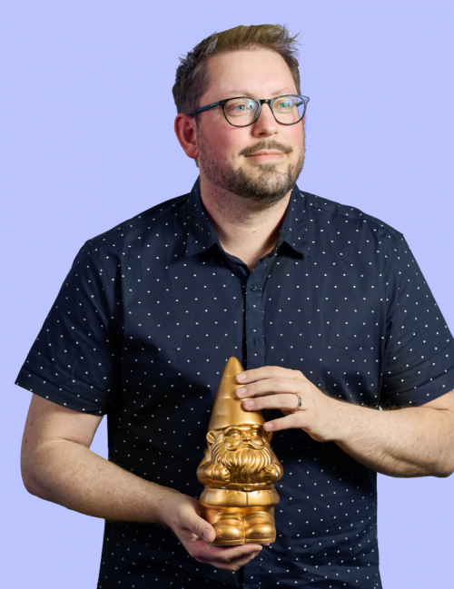 Barry holding a golden gnome