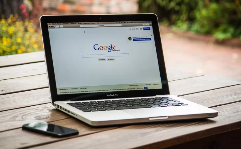 A laptop with Google loaded up on a browser